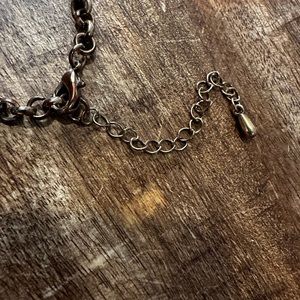 BOGO!! 
Bronze and goldish spikes, bronze chain